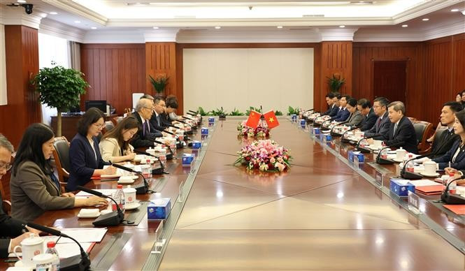 越中两国最高人民法院举行座谈。图自越通社