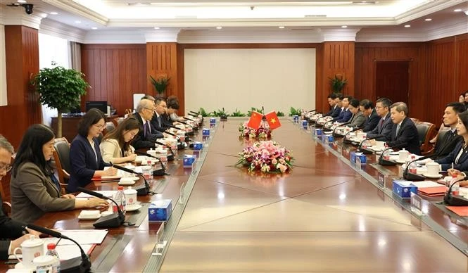 越中两国最高人民法院举行座谈。图自越通社