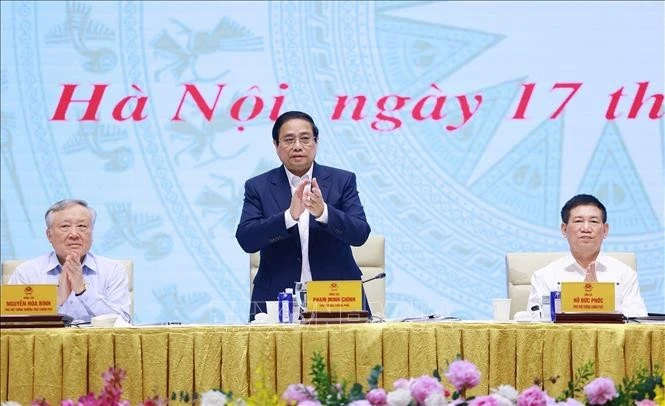 越南政府总理范明政出席会议。图自越通社