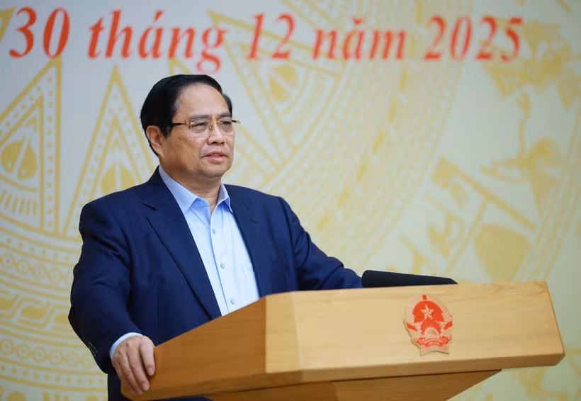越南政府总理范明政在会议上发表讲话。图自越通社