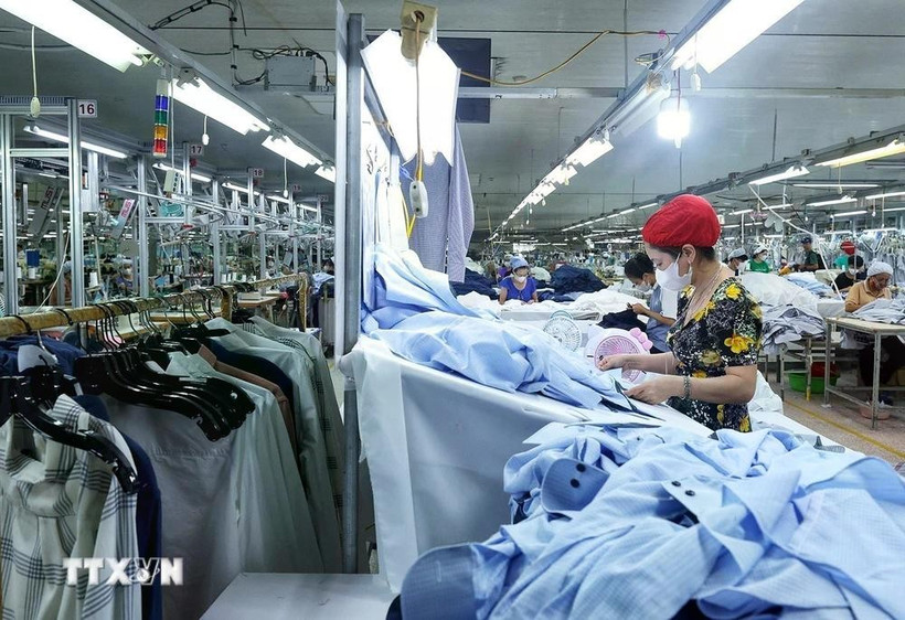 一家服装出口公司。图自越通社