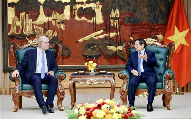 越南政府总理范明政会见国际海洋法法庭庭长托马斯·海达尔。图自越通社