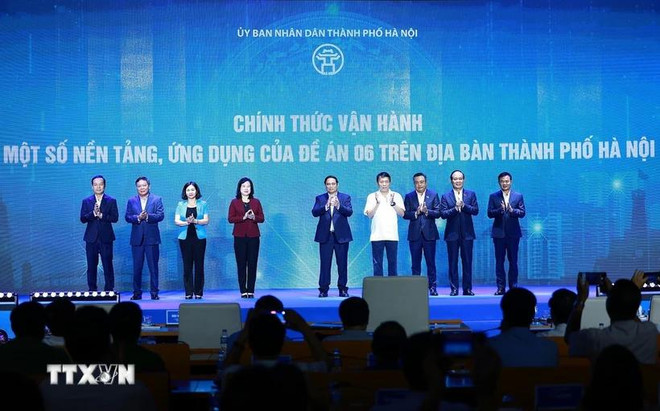 范明政出席专门服务于第06号方案的平台和应用程序正式投运仪式。图自越通社 20240628-thu-tuong-de-an-06-tp-ha-noi-9-1545.jpg.webp