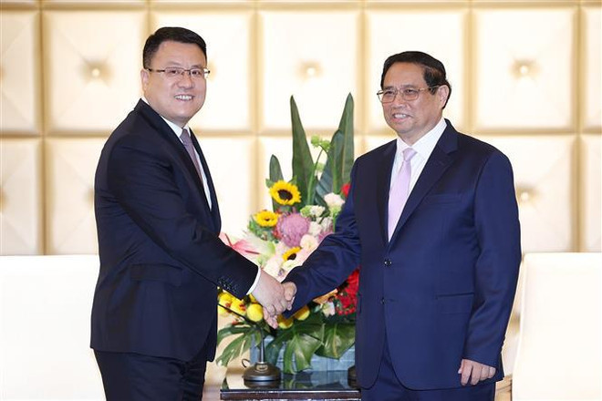 越南政府总理范明政会见中国电建集团(PowerChina)副总经理王小军。图自越通社 l_thu_tuong_pham_minh_chinh_tiep_mot_so_doanh_nghiep_trung_quoc_7446181.jpg
