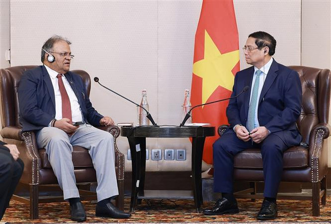 越南政府总理范明政会见印度石油天然气公司 董事长Arun Kumar Singh。图自越通社 thu_tuong_pham_minh_chinh_tiep_mot_so_tap_doan_hang_dau_an_do_7513776.jpg
