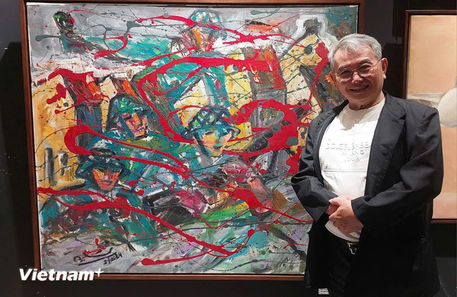 画家阮鹏林画家与《首都团的战士》。Vietnam+ 7.webp