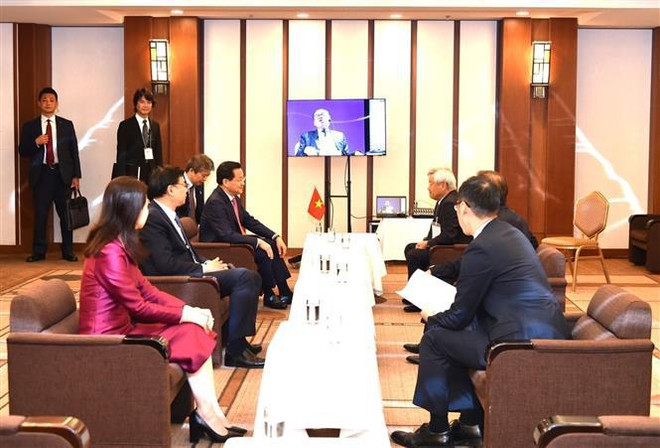 黎明慨会见了日本经济新闻社(日经集团)社长冈田直敏。图自越通社 pho_thu_tuong_chinh_phu_le_minh_khai_du_hoi_nghi_tuong_lai_chau_a_lan_thu_29___7391894.jpg
