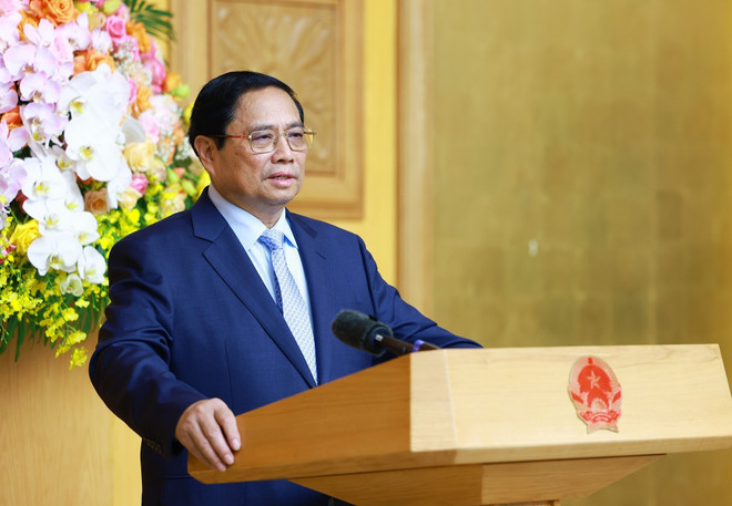 越南政府总理范明政发表讲话。图自越通社 vna_potal_thu_tuong_pham_minh_chinh_toa_dam_voi_cac_doanh_nghiep_hang_dau_trung_quoc_trong_linh_vuc_kinh_te_xanh_7374618.jpg