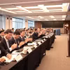越南政府常务副总理阮和平走访纽约主要证券交易所并出席投资促进座谈会