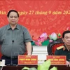 越南政府总理范明政在会议上发表讲话。图自越通社