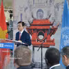 越南外交部副部长、越南UNESCO国家委员会主席吴黎文致开幕词。图自越通社