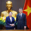 越南政府总理黎明兴会见老挝人民革命党中央组织部部长西赛·勒德门松。图自越通社