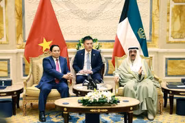 政府总理范明政会见科威特国王