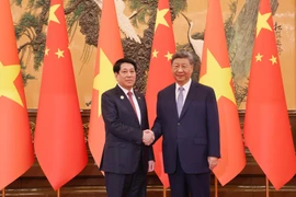 国家主席梁强同中共中央总书记、国家主席习近平举行会谈