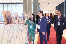 越南通讯社在《河内公约》开放签署仪式上举办图片展