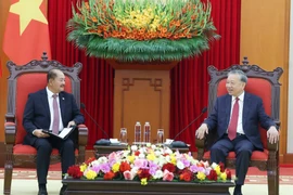 苏林总书记会见老挝人民革命党代表团
