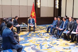 范明政总理会见马来西亚龙头企业代表