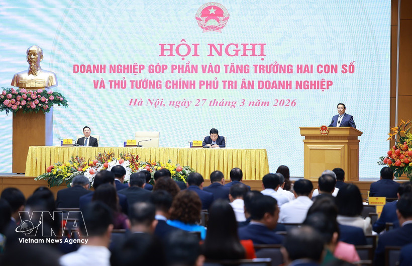 越南政府总理范明政主持关于实现经济两位数增长会议。图自越通社