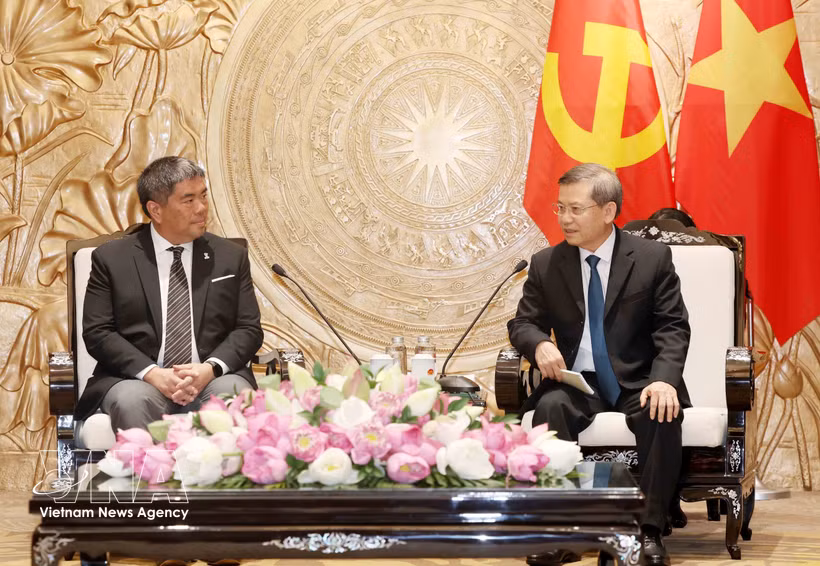  越共中央内政部长黎明智会见泰国民主党副领导伊斯拉·桑托兰武特。图自越通社