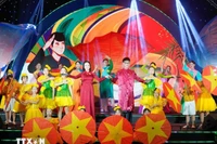 开幕式上的文艺节目。图自越通社