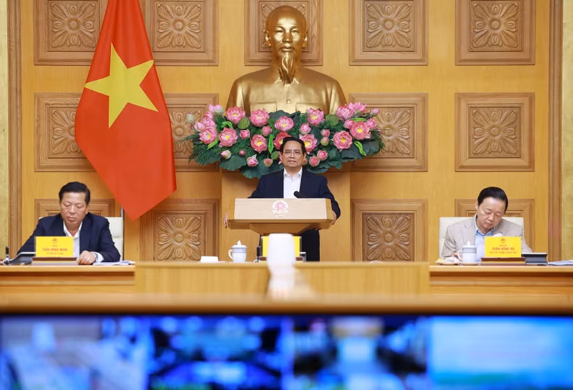 范明政在国家重点交通工程项目指导委员会第22次会议上发表讲话。图自越通社
