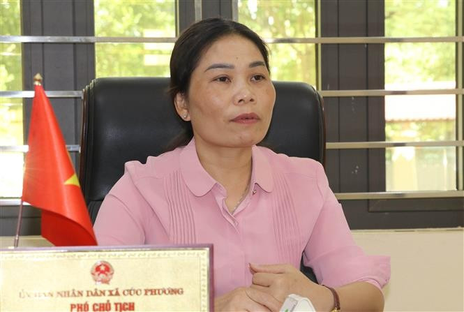 菊芳乡人民委员会副主席丁氏文。图自越通社