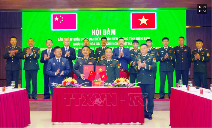 双方合作备忘录签署仪式。图自越通社