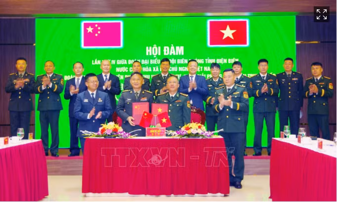 双方合作备忘录签署仪式。图自越通社
