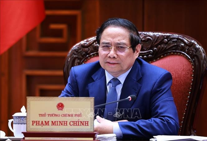 越南政府总理范明政主持召开与CT集团领导的工作会议。图自越通社