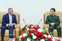 会见场景 图自越通社