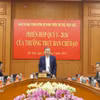 越共中央总书记、中央完善法律制度指导委员会主任苏林主持会议。图自越通社
