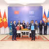 越共中央书记处常务书记陈锦秀出席越柬合作文件交换仪式。图自越通社