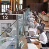 客户在越南外贸股份商业银行（Vietcombank）办理业务。图自越通社