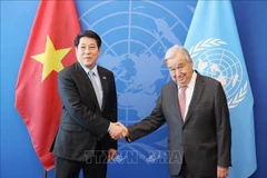 越南国家主席梁强会见联合国秘书长安东尼奥·古特雷斯。图自越通社