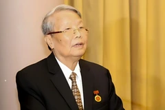 越南原国家主席陈德良。图自越通社