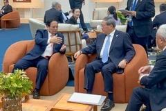 越南政府总理范明政会见中国国务院总理李强。图自互联网