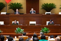 会议场景。图自越通社