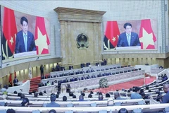 越南国家主席梁强出席安哥拉国民议会特别全体会议并发表讲话。图自越通社