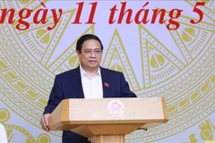 政府总理、全国危旧房清零行动中央指导委员会(以下简称为指导委员会)主任范明政主持召开指导委员会第四次会议。图自越通社