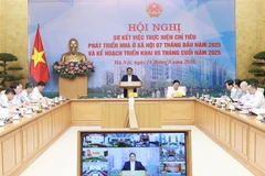 政府总理范明政主持召开全国保障性住房发展视频会议。图自越通社