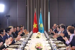 苏林总书记会见哈萨克斯坦议会下院议长叶尔兰·科沙诺夫场景。图自越通社