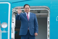 政府总理范明政启程赴中国天津出席世界经济论坛第十六届新领军者年会。图自越通社