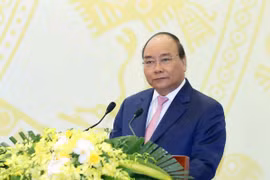 越南政府总理阮春福出席越南外国非政府组织工作委员会21年工作总结会议（组图）