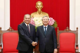 越共书记处常务书记陈国旺会见老挝人民革命党代表团
