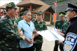 越中两国警方配合逮捕通缉犯