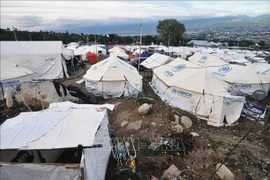 印尼帕卢地震海啸后一年 近6万人仍住在临时住所