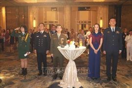 越南人民军建军75周年纪念活动在新加坡举行