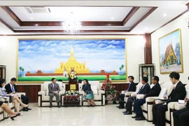 庆祝老挝人民革命党建党64周年