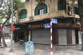 组图: 河内街头店铺、咖啡店歇业 严格限制人群聚集