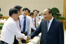 越南政府总理阮春福会见记者协会代表庆祝越南革命新闻日（组图）
